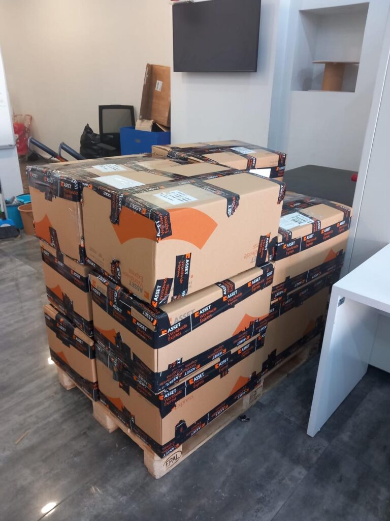 Private label tracksuits packed for export shipment to Switzerland