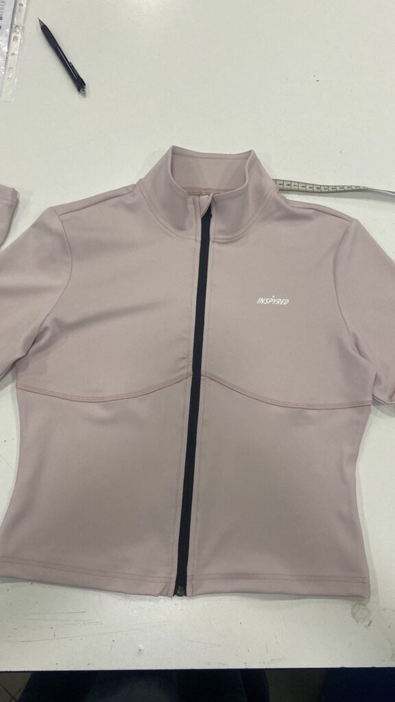 Production sports jacket from elastic & breathable nylon/elastane fabric by Alle Textile.